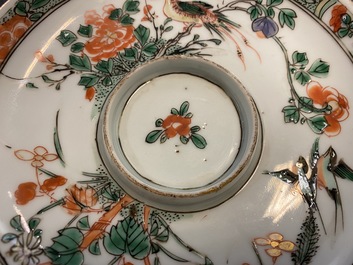 Two Chinese famille verte cup stands, a teapot and a plate, Kangxi